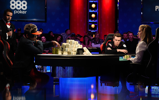 Qui Nguyen, left, of Las Vegas and Gordon Vayo of San Francisco compete during the final table at the 2016 World Series of Poker Main Event at the Rio hotel-casino, Tuesday, Nov. 1, 2016, in Las V ...