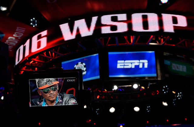 An image of Qui Nguyen of Las Vegas is displayed on a television camera monitor while he competes during the final table at the 2016 World Series of Poker Main Event at the Rio hotel-casino, Tuesd ...