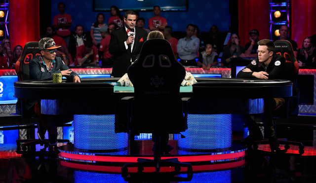 Qui Nguyen, left, of Las Vegas and Gordon Vayo of San Francisco compete during the final table at the 2016 World Series of Poker Main Event at the Rio hotel-casino, Tuesday, Nov. 1, 2016, in Las V ...
