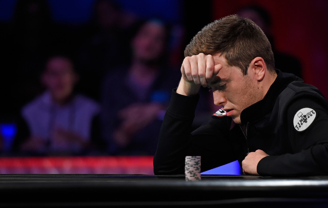 Gordon Vayo of San Francisco ponders to call an all-in bet during the final table at the 2016 World Series of Poker Main Event at the Rio hotel-casino, Tuesday, Nov. 1, 2016, in Las Vegas. Vado ch ...