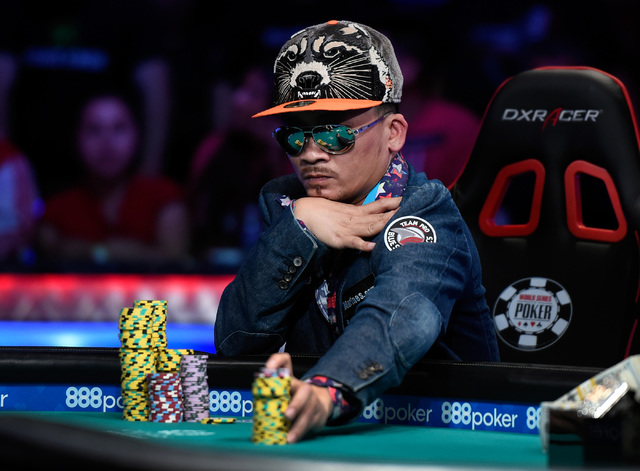 Qui Nguyen of Las Vegas bets a stack of chips during the final table at the 2016 World Series of Poker Main Event at the Rio hotel-casino, Tuesday, Nov. 1, 2016, in Las Vegas. David Becker/Las Veg ...