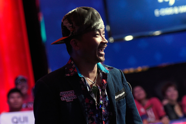 Qui Nguyen of Las Vegas is all smiles just before his first place victory at the final table at the 2016 World Series of Poker Main Event at the Rio hotel-casino Wednesday, Nov. 2, 2016, in Las Ve ...