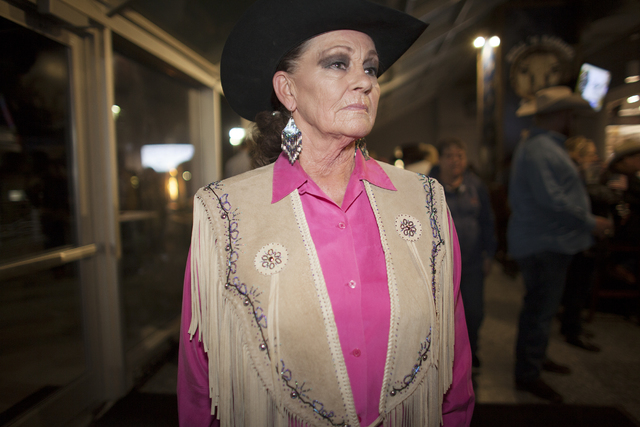 Mary Novak shows off her leather pancho at the National Finals Rodeo at Thomas & Mack Cente ...