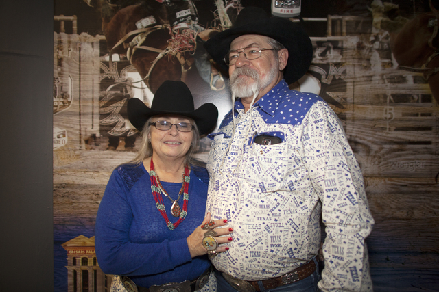 Sandy and Charlie Bush in coordinating outfits at the National Finals Rodeo at Thomas & Mac ...