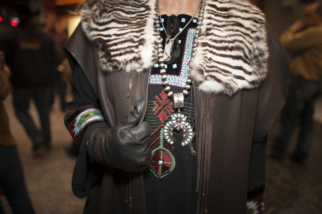 Shelly Weppler shows off her leather jacket and jewelry at the National Finals Rodeo at Thomas ...