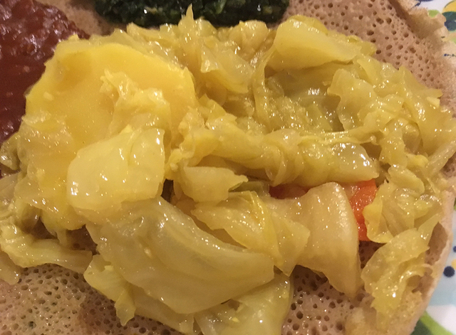 Yellow cabbage and potatoes contribute to the vegeterian combination's palette of colors. BRIAN ...