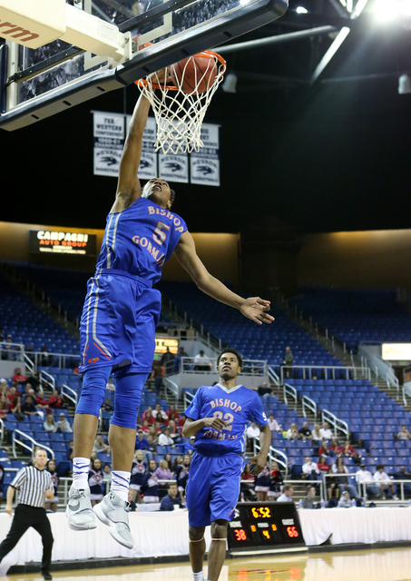 Bishop Gorman's Chuck O'Bannon dunks against Coronado during the NIAA Division I state basketball championship in Reno, Nev. on Friday, Feb. 26, 2016. Bishop Gorman won the title 83-63. (Cathleen  ...