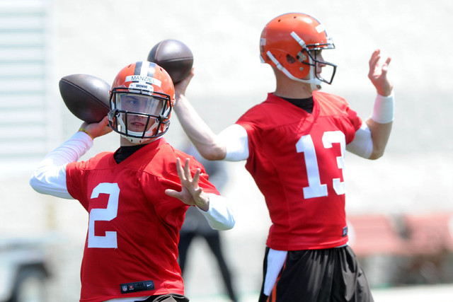 Jun 16, 2015; Berea, OH, USA; Cleveland Browns quarterback Johnny Manziel (2) and Cleveland Browns quarterback Josh McCown (13) during minicamp at the Cleveland Browns practice facility. (Ken Blaz ...