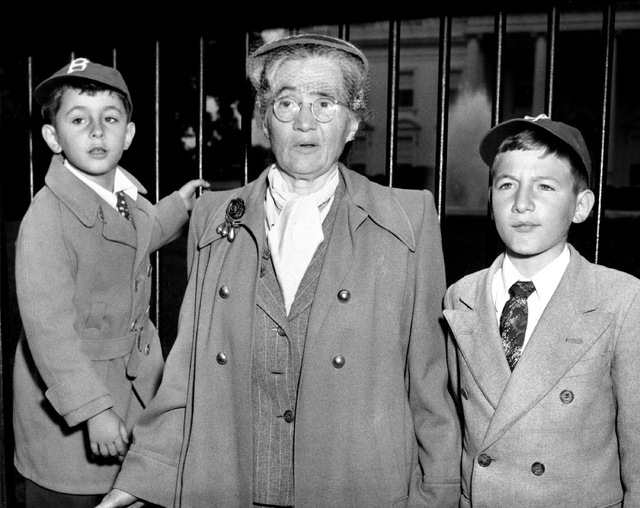 In this June 14, 1953 file photo, Sophie Rosenberg is shown with her grandsons Robert, 6, left, and Michael, 10, outside the White House in Washington, D.C., during a demonstration seeking clemenc ...