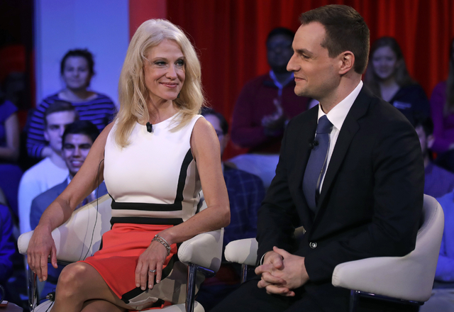 Kellyanne Conway, Trump-Pence campaign manager, left, looks towards Robby Mook, Clinton-Kaine campaign manager, prior to a forum at Harvard University's Kennedy School of Government in Cambridge, ...
