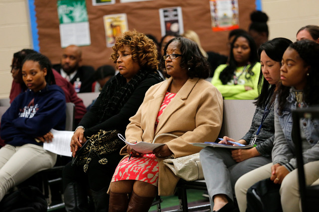 Robin Harris, elementary school principal of Andre Agassi College Preparatory Academy, third from right, attends a Governing Board meeting at the academy in Las Vegas, Tuesday, Dec. 13, 2016. (Chi ...