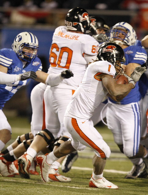 Oregon State's Jacquizz Rodgers runs on the way to a fourth quarter touchdown in the Las Vegas Bowl NCAA college football game in Las Vegas, Tuesday Dec. 22, 2009 won by BYU 44-20. (AP Photo/Danie ...