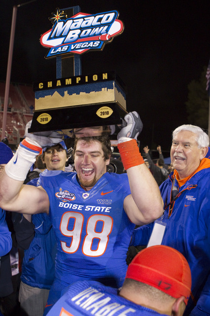 Boise State defensive end Ryan Winterswyk celebrates their 26-3 victory over Utah in the Maaco Bowl NCAA college football game, Wednesday Dec. 22, 2010, in Las Vegas. (Eric Jamison/AP)