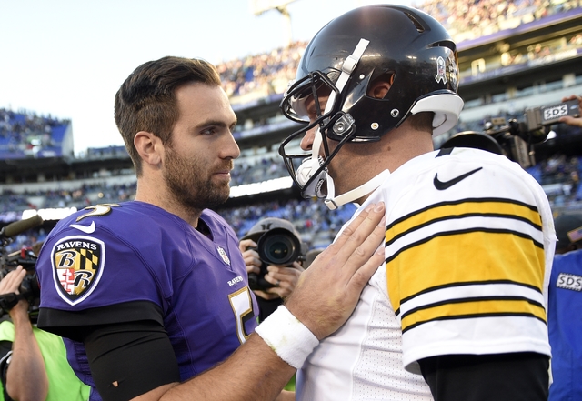 Baltimore Ravens quarterback Joe Flacco, left, and Pittsburgh Steelers quarterback Ben Roethlisberger chat after an NFL football game, Sunday, Nov. 6, 2016, in Baltimore. (AP Photo/Nick Wass)