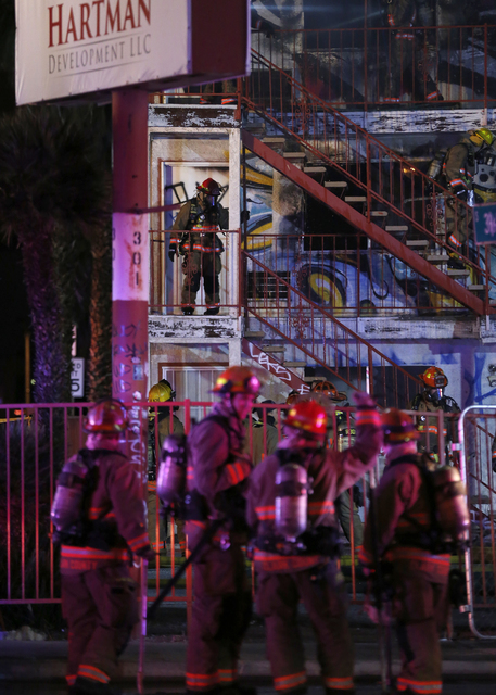 Las Vegas Fire & Rescue crews attack a two-alarm fire near Charleston Boulevard and 3rd Street in Las Vegas on Friday, Dec. 2, 2016. More than 60 firefighters responded. (Rachel Crosby/Las Veg ...