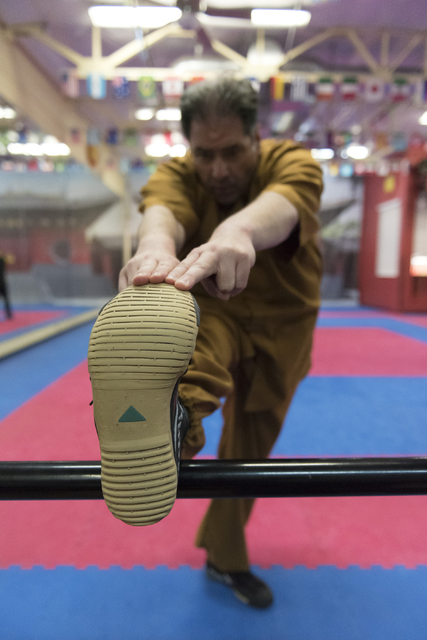 Rabbi Felipe Goodman stretches during a kung fu lesson at Shaolin Kungfu Chan in Las Vegas Friday, July 29, 2016. Rabbi Goodman does kung fu as a way to relieve workplace stress. (Jason Ogulnik/La ...