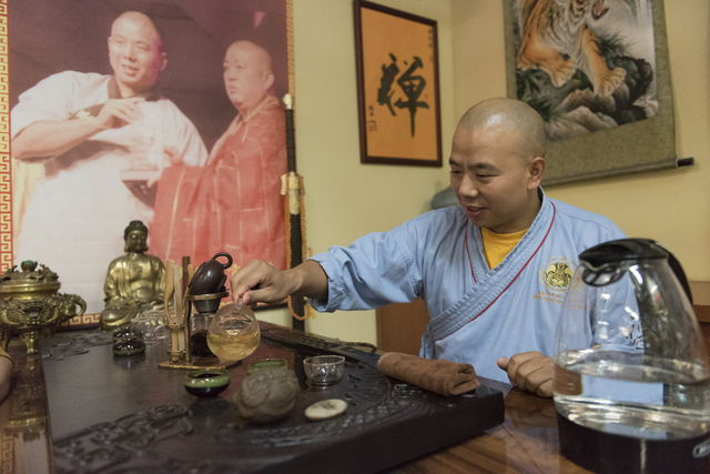 Shifu Shi Xing Wei prepares green tea during a break while giving a kung fu lesson to Rabbi Felipe Goodman at Shaolin Kungfu Chan in Las Vegas Friday, July 29, 2016. (Jason Ogulnik/Las Vegas Revie ...