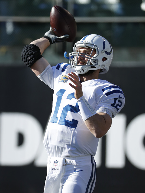 Indianapolis Colts quarterback Andrew Luck (12) warms up before an NFL football game against the Oakland Raiders in Oakland, Calif., Saturday, Dec. 24, 2016. (AP Photo/Tony Avelar)
