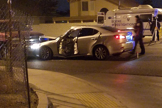 North Las Vegas Police said a motorcycle eastbound on Ann Road hit the driver-side front door of a sedan on Thursday night. (Mike Shoro/Las Vegas Review-Journal) @mike_shoro