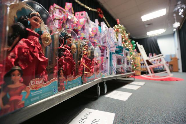 Toys wait behind a curtain to be given away to students at C.T. Sewell Elementary School in Henderson on Friday, Dec. 16, 2016. The gifts were donated by Bob and Sandy Ellis, who have donated more ...
