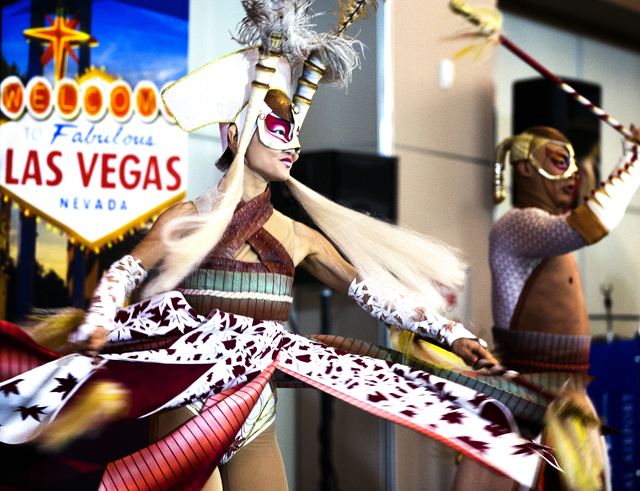 Members of Ka perform for passengers and dignitaries during a Hainan Airlines inaugural reception at McCarran International Airport on Friday, Dec. 2, 2016.The first nonstop flight from China arr ...