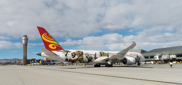 Hainan Airlines flight 7969, a Boeing 787 from Beijing, taxis to the gate at McCarran International Airport in Las Vegas to inaugurate regular nonstop service from Beijing on Friday, Dec. 2, 2016. ...