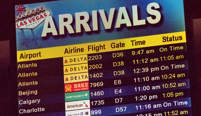 Hainan Airlines flight 7969, a Boeing 787 from Beijing, is listed on the arrivals screen at McCarran International Airport in Las Vegas as Hainan begins regular nonstop service from Beijing on Fr ...