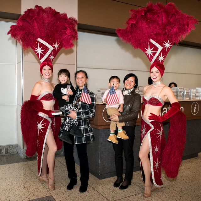 New arrivals are greeted by the Las Vegas Showgirls to celebrate the arrival of Hainan Airlines first flight from Beijing to McCarran International Airport in Las Vegas on Friday, Dec. 2, 2016. CR ...