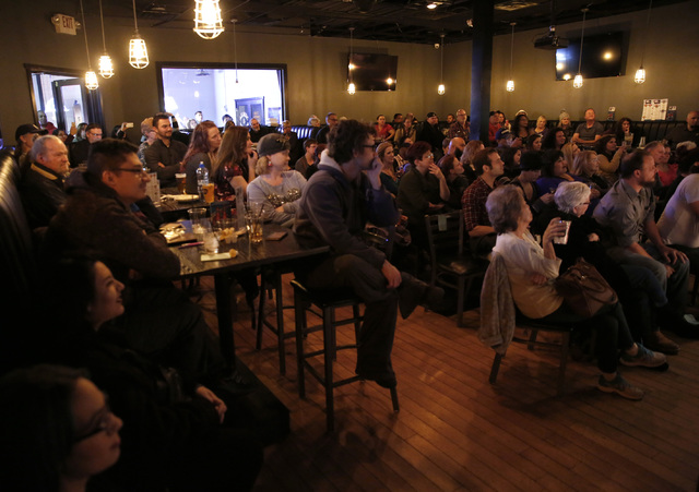 The audience at ASL SLAM at E-String Grill and Poker Bar in Henderson on Dec. 3, 2016. ASL SLAM is a space for Deaf performing artists to share poetry and storytelling in American Sign Language. ( ...