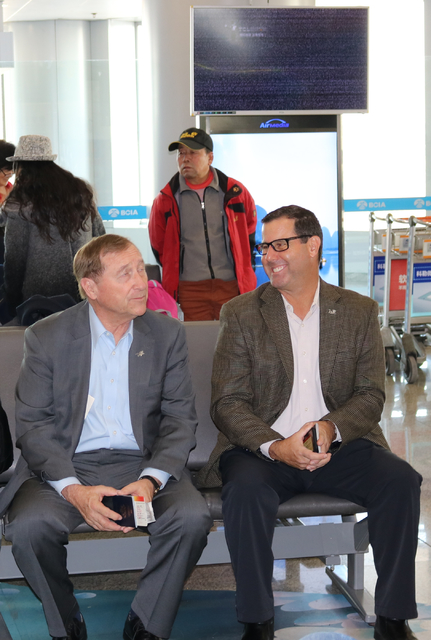 Las Vegas Convention and Visitors Authority president Rossi Ralenkotter, left, and Michael Goldsmith, LVCVA vice president of international marketing, prepare to board the inaugural Hainan Airline ...