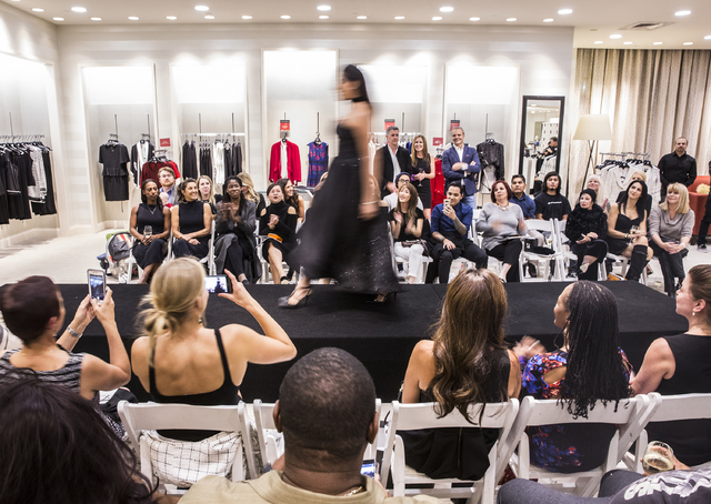 Model Flor de Liz Guior walks the runway at Saks Fifth Avenue on Thursday, Nov. 17, 2016, at Fashion Show Mall, in Las Vegas. The event, titled &quot;Little Black Dress,&quot; was a studen ...