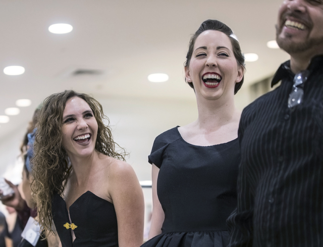 Models Bailee Baldwin, left, and Dianna Aufdermauer share a laugh at Saks Fifth Avenue on Thursday, Nov. 17, 2016, at Fashion Show Mall, in Las Vegas. The event, titled "Little Black Dres ...