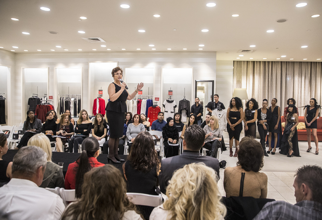 Marlene Richter, executive director of The Shade Tree, speaks at the  "Little Black Dress" event at Saks Fifth Avenue on Thursday, Nov. 17, 2016, at Fashion Show Mall, in Las Vegas. The event was  ...