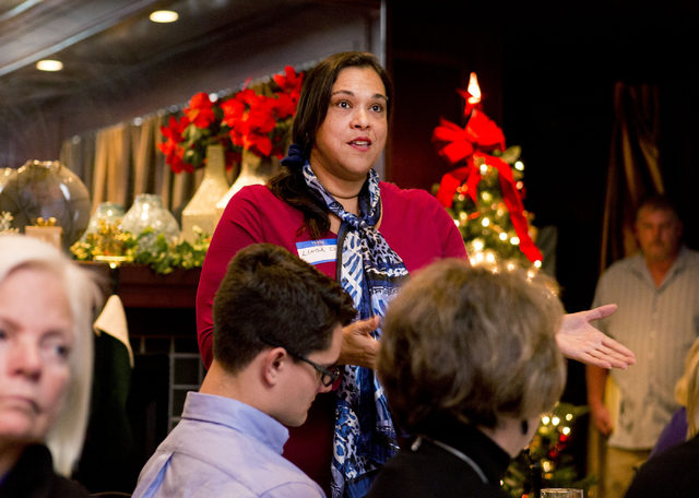 Linda Detres, volunteer for Wecan, asks Senator Patricia Farley about how packaging for edibles will be any different than alcohol packaging during a panel discussion constructed of marijuana labo ...