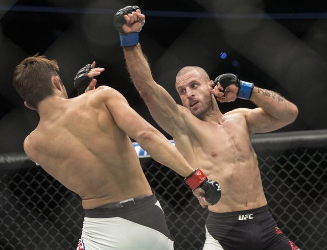 Tarec Saffiedine lands a strike against Dong Hyun Kim during their welterweight fight at UFC 207 at T-Mobile Arena on Friday, Dec. 30, 2016, in Las Vegas. Benjamin Hager/Las Vegas Review-Journal
