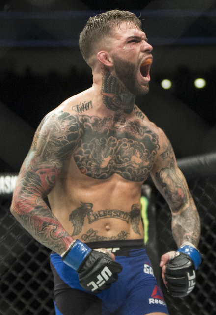 Cody Garbrandt screams to the crowd during his bantamweight fight with Dominick Cruz at UFC 207 at T-Mobile Arena on Friday, Dec. 30, 2016, in Las Vegas. Benjamin Hager/Las Vegas Review-Journal