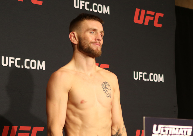 At The Palms on Dec. 2, 2016, Tim Elliott weighs-in at 125-pounds and makes the battle for the UFC flyweight title at The Ultimate Fighter 24 Finale official. (Heidi Fang/Las Vegas Review-Journal) ...
