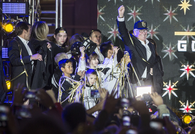 Golden Knights owner Bill Foley, right, celebrates at the conclusion of a ceremony to unveil the Las Vegas' NHL expansion franchise's official team nickname, logos and colors on Tuesday, Nov. 22, ...