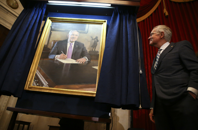 U.S. Sen. Harry Reid looks at a portrait of himself after it was unveiled during a ceremony on Capitol Hill in Washington D.C. on Thursday, Dec. 8, 2016. (Chase Stevens/Las Vegas Review-Journal) @ ...