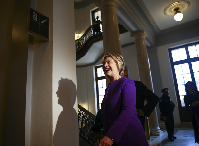 Former Secretary of State Hillary Clinton arrives for a ceremony to unveil a portrait of Senate Minority Leader Harry Reid, D-Nev., on Capitol Hill in Washington D.C. on Thursday, Dec. 8, 2016. (C ...