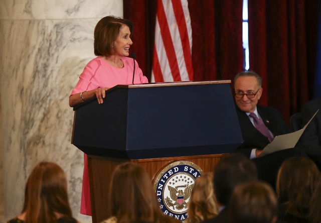 House Minority Leader Nancy Pelosi, D-Calif., speaks during a ceremony to unveil a portrait of Senate Minority Leader Harry Reid, D-Nev., on Capitol Hill in Washington D.C. on Thursday, Dec. 8, 20 ...