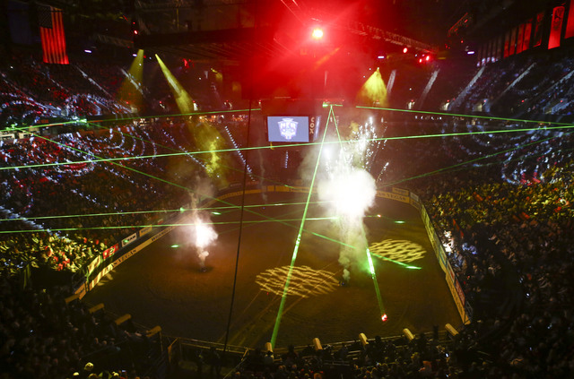 Fireworks and lights fill the arena at the start of the 2nd go-round of the National Finals Rodeo at the Thomas & Mack Center in Las Vegas on Friday, Dec. 2, 2016. (Chase Stevens/Las Vegas Rev ...