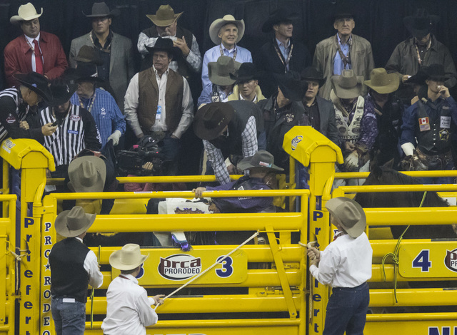 Bareback riding competition on the final night of the National Finals Rodeo at the Thomas & Mack Center in Las Vegas on Saturday, Dec. 9, 2016. (Miranda Alam/Las Vegas Review-Journal) @miranda ...