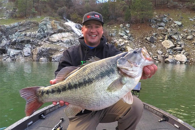 Angler hooks apparent record spotted bass in California