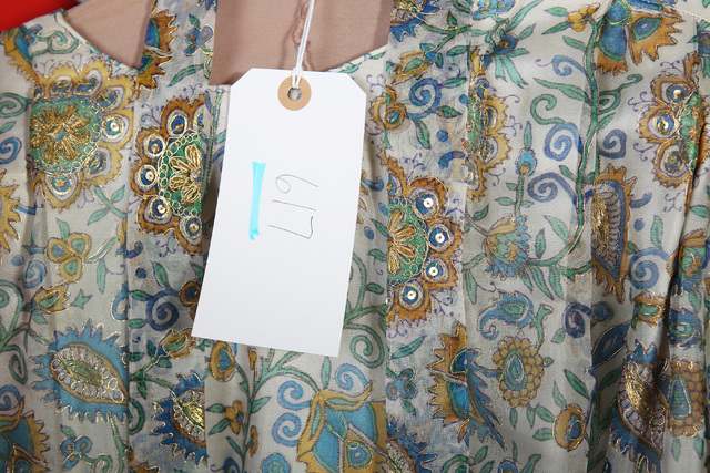 A tag hangs from a piece of clothing from the collection of Corinne Sidney. (Sam Morris/Las Vegas Review-Journal)