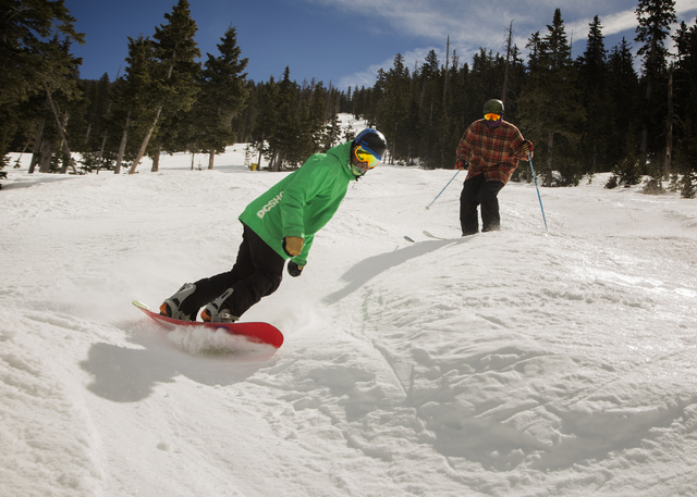 Marco Sanchez of Gilbert, Arizona, and Scott Cumberland of Anchorage, Alaska, try the moguls  at Arizona Snowbowl on March 5, 2016. The resort, just outside of Flagstaff, has been in operation sin ...