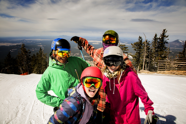 Clockwise from top right, Scott Cumberland, Heather Cason, Rylie Backus and Marco Sanchez pose for a photo on the slopes of Arizona Snowbowl on March 5, 2016. The resort, just outside of Flagstaff ...