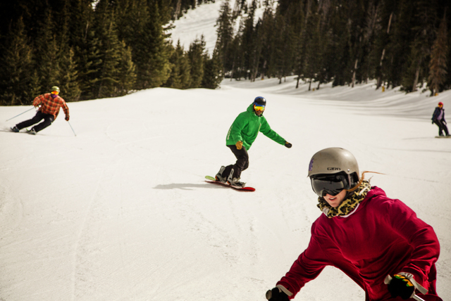 Skiers and snowboarders cruise down a trail at Arizona Snowbowl on March 5, 2016. The resort, just outside of Flagstaff, has been in operation since 1938, making it one of the longest continually  ...