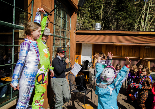 Young skiers cheer during a ski medal ceremony at Arizona Snowbowl on March 5, 2016. The resort is just outside of Flagstaff and has been in operation since 1938, making it one of the longest cont ...