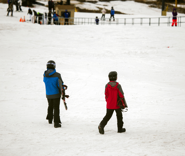 Young skiers head to a lift at Arizona Snowbowl on March 6, 2016. The resort is just outside of Flagstaff and has been in operation since 1938, making it one of the longest continually running ski ...